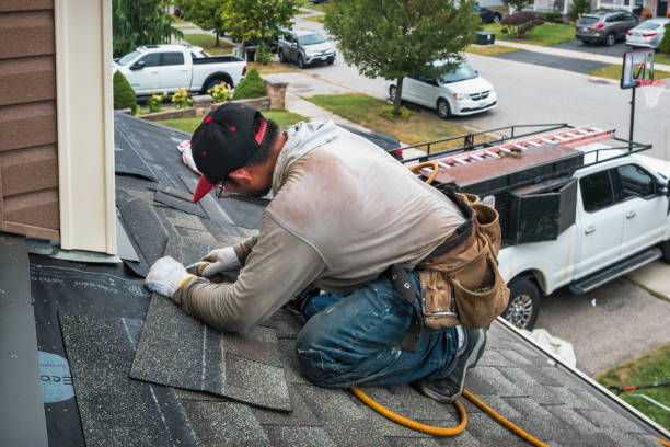 Professional Storm Damage Roof Repair technician working in West Point, VA